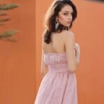 Backless pink strapless mini dress with ruched details