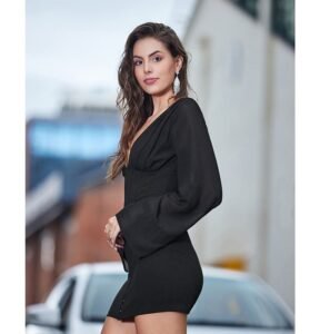 Black elegant long-sleeved mini dress back view on model