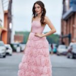 Pink evening gown with floral skirt side view