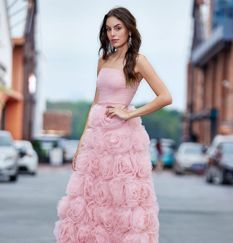 Pink evening gown with floral skirt side view