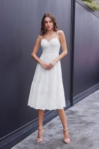 Sleeveless white dress outdoor style