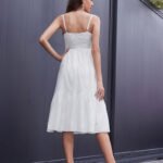 White floral embroidery dress closeup