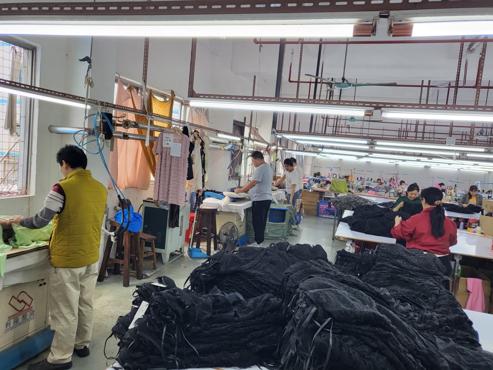 garment finishing and quality control in women clothing manufacturer factory